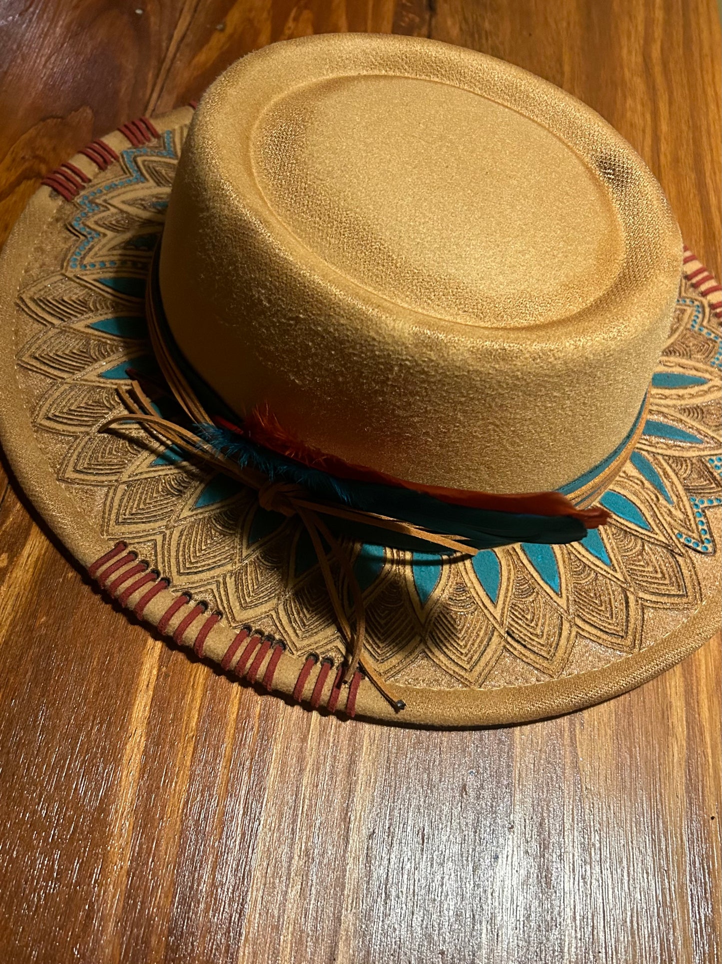 Free hand burned felt hat